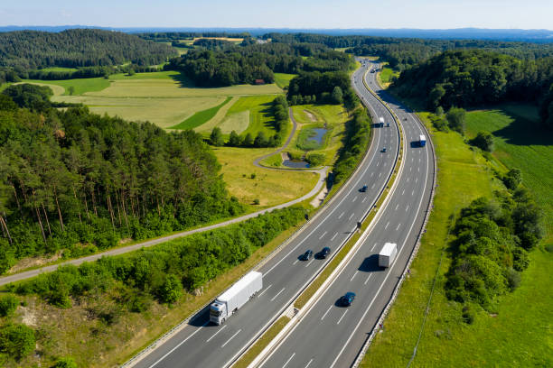 istock Aerial View of Trucks on Highway 1378229677