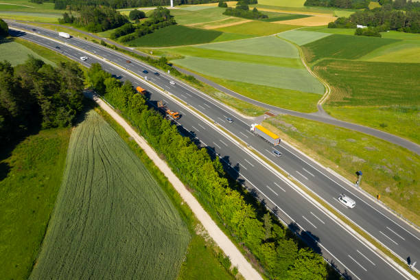 istock Aerial View of Trucks on Highway 1378235521