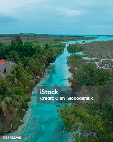 istock Aerial view of  red canoe on Bacalar Lagoon in Mexico 1378253245