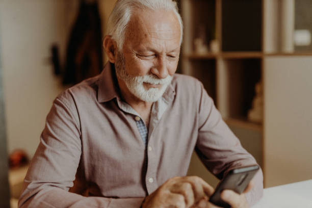 istock Senior man shopping online 1378257650