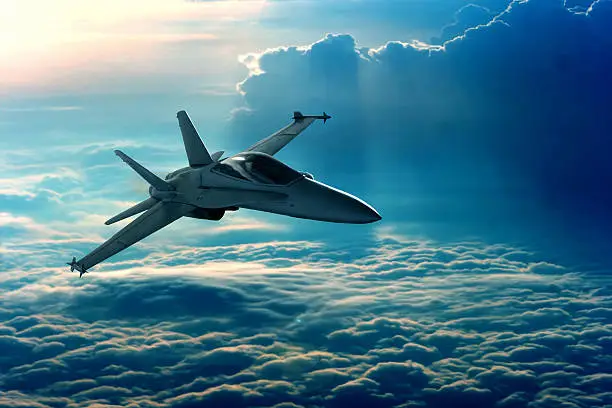 View of a fighter jet above the clouds