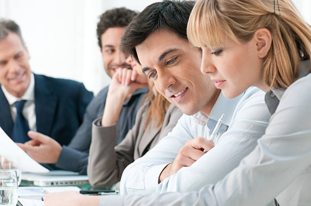 istock A group of business professionals working together 137827663
