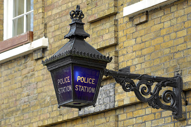 Blue Lamp A traditional British (Victorian) Police Station Blue Lantern - still in use outside many Police buildings in the United Kingdom metropolitan police stock pictures, royalty-free photos & images