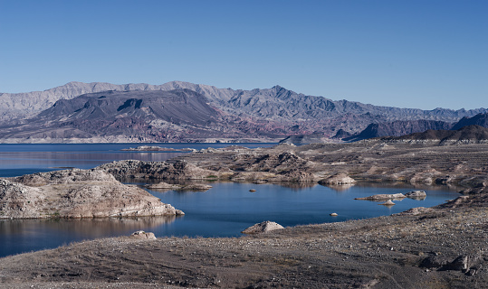 This image shows a view of Lake Mead in Nevada. Lake Mead is a reservoir formed by the Hoover Dam on the Colorado River in the Southwestern United States.