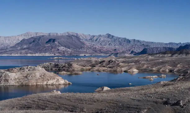This image shows a view of Lake Mead in Nevada. Lake Mead is a reservoir formed by the Hoover Dam on the Colorado River in the Southwestern United States.