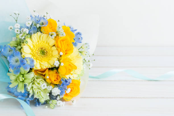 Yellow bouquet of roses and gerberas