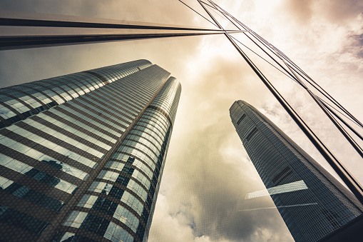 Urban abstract background, detail of modern glass facade, office business building