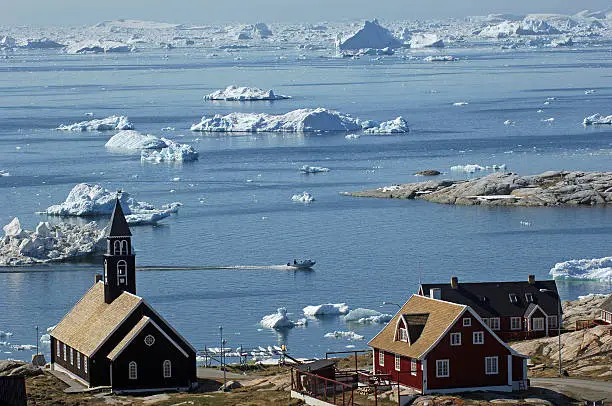 The town of Ilulissat (formally known as Jakobshavn) on the west coast of Greenland and overlooking Disko Bay. 