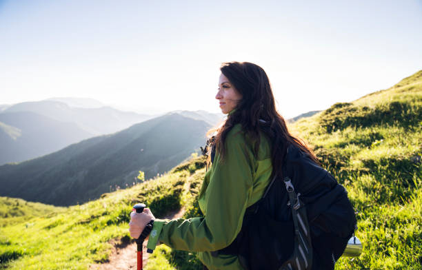 istock Young woman exploring the mountain. 1378379888