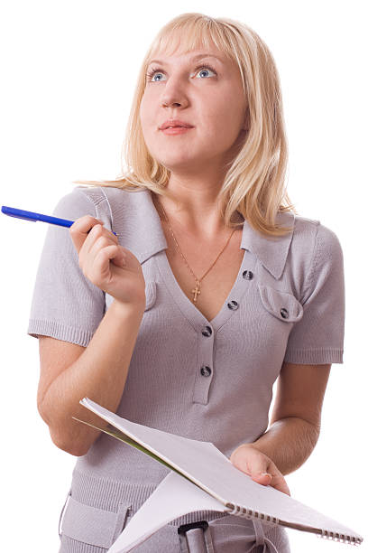 istock Blonde woman with note pad. Isolated. 137840928