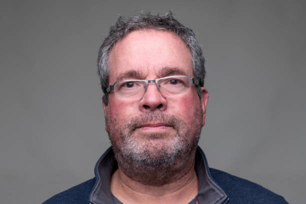 istock Front view of a Unshaved, mature man looking at the camera 1378442165