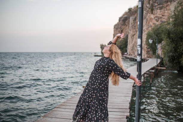 istock Tourist enjoying looking at the sea 1378443603