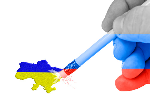 ukraine map deleted erase by russian erasor holded by hand in russian flag s colors space for your text - 3d rendering