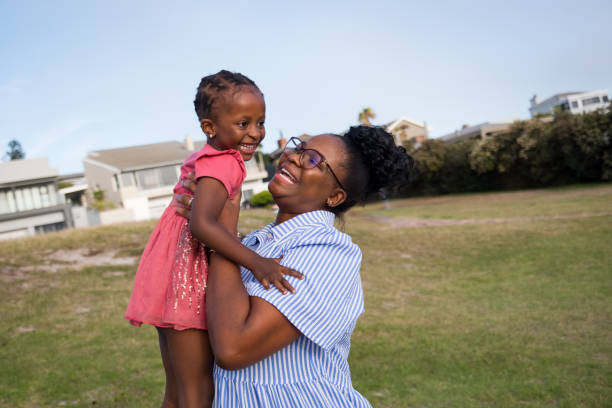 istock A single mother plays with her daughter at the park 1378510145