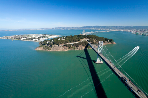 San Francisco Bay bridge and Treasure Island aerial view
