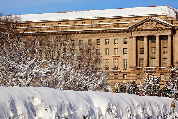 istock Justice Department After Snow Constitution Avenue Washington DC 137859612