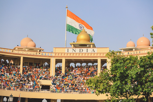 Wagah Border, Pakistan - July 22, 2021: View to the Main Gates of  Attari-Wagah border with the flags of India and Pakistan