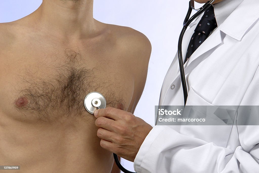 Medical investigation   the stethoscope doctor studies the patient stethoscope. Cardiologist Stock Photo