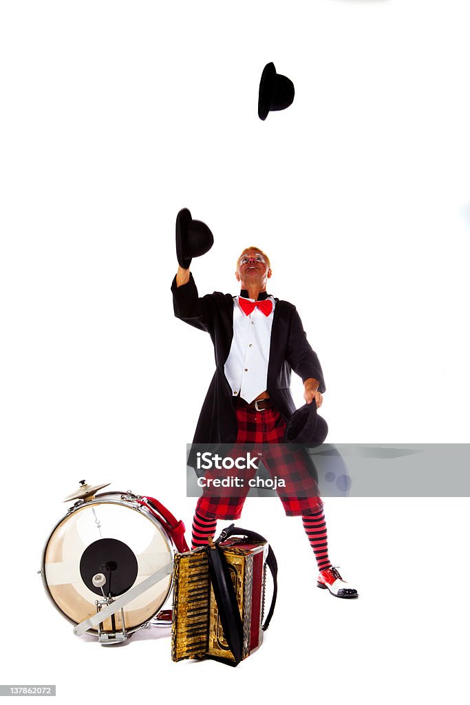 Clown ist Jonglieren mit Mützen - Lizenzfrei Weißer Hintergrund Stock-Foto