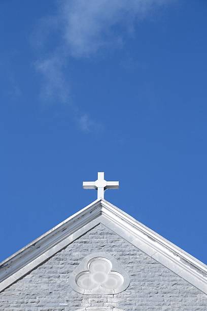 istock Cross on church roof 137863722