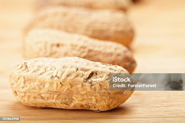 Peanuts In Shells Stock Photo - Download Image Now - Close-up, Cutting Board, Food