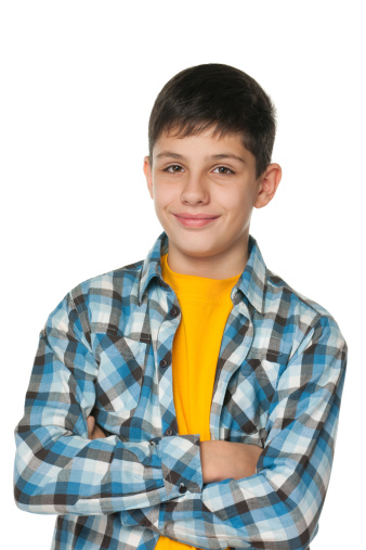 A portrait of a fashion smilingl teenager; isolated on the white background