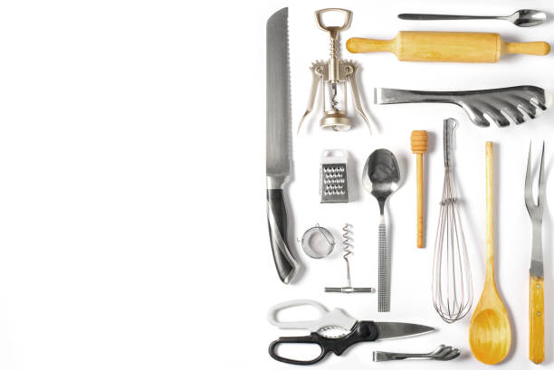 istock Wooden and metal kitchen utensils. Tools for cooking. White background. Flat lay 1378644445