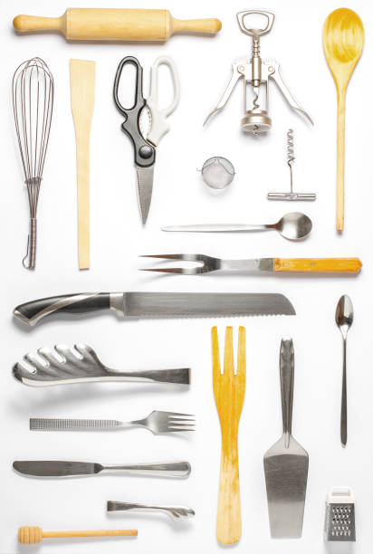 istock Wooden and metal kitchen utensils. Tools for cooking. White background. Flat lay 1378644959