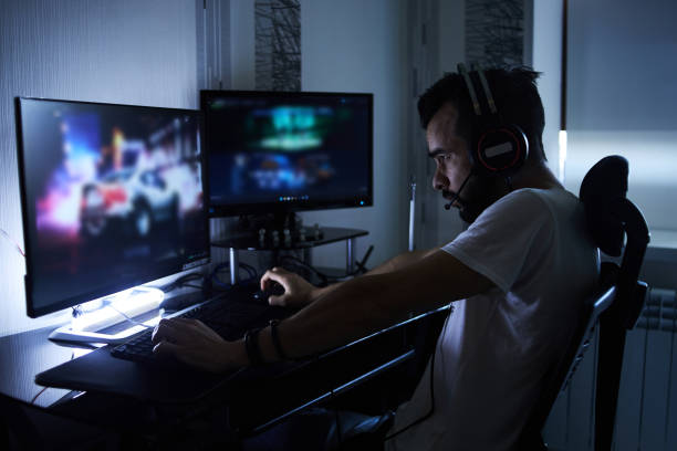 istock a young 30-year-old gamer is sitting at a computer, playing computer games, nervous, angry, worried.selective focus with low depth of focus 1378673671