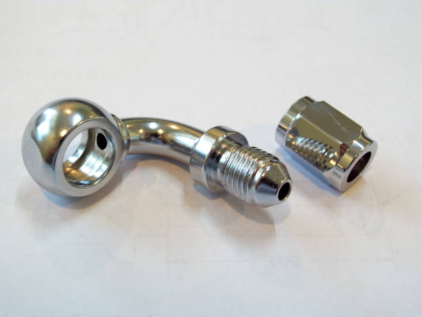 istock Banjo hydraulic fittings and bolt on white background. 1378687558
