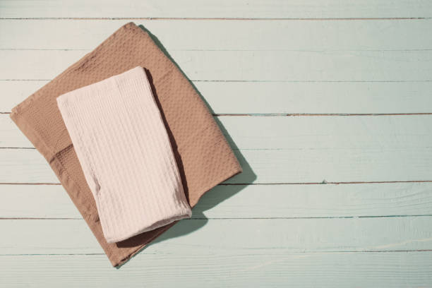 istock napkins on old blue wooden table 1378704046