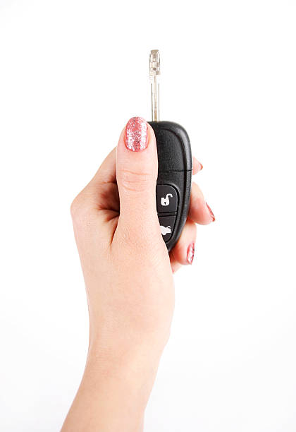 istock Female hand holding a car key 137872046