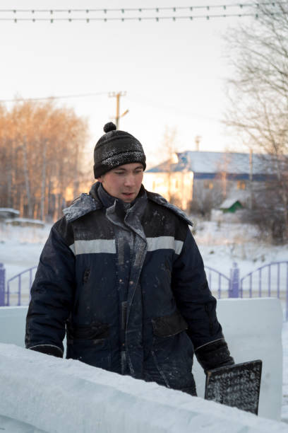 istock Assembler at the construction site with a brush in his hands 1378721146