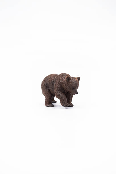 istock Toy animal figure brown bear on white. 1378727050