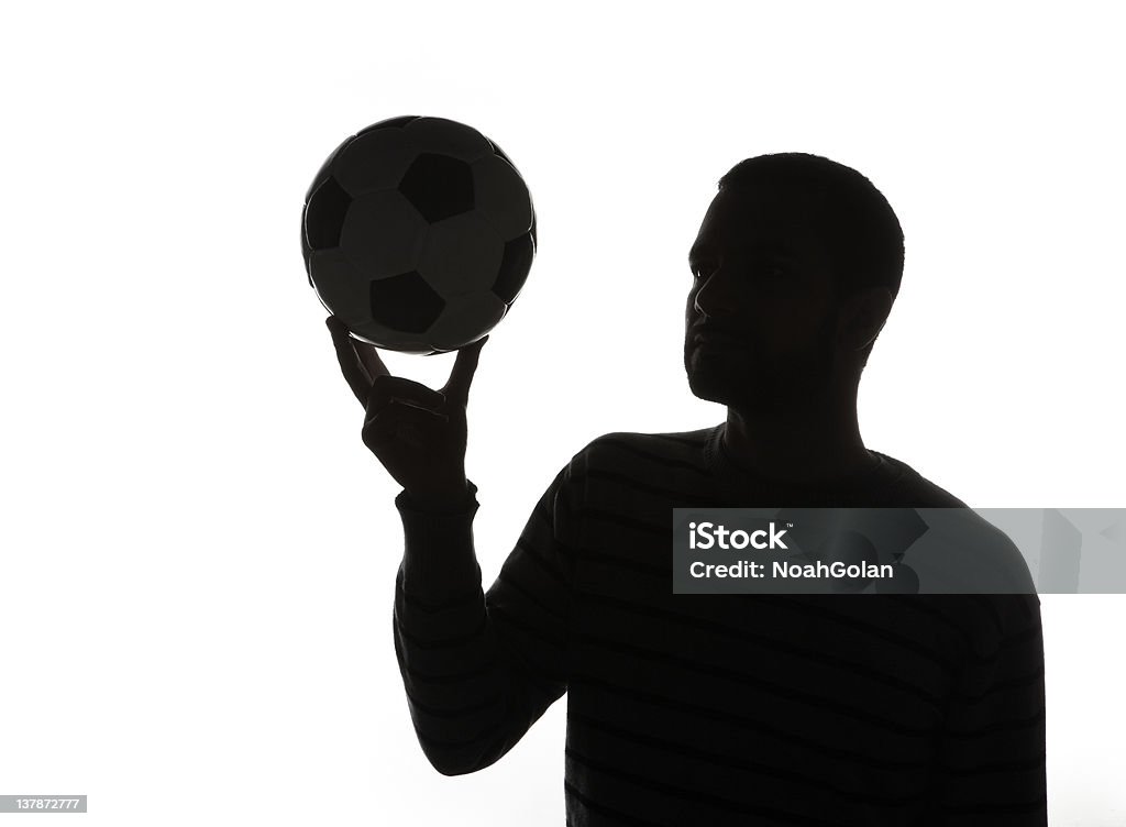 Hombre que agarra de bola - Foto de stock de Fútbol libre de derechos