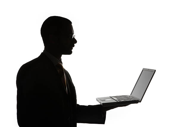 istock Businessman holding laptop 137872810