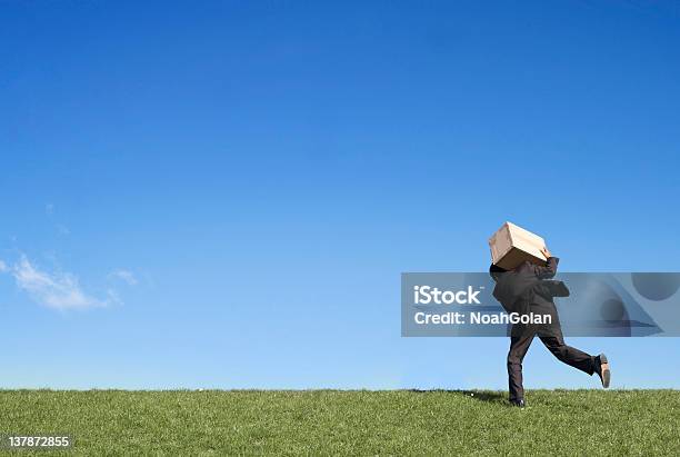 Businessman Running With Box Stock Photo - Download Image Now - Box - Container, Carrying, Suit