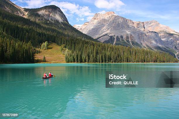 Canoeists On Emerald Lake Stock Photo - Download Image Now - Canoeing, Banff National Park, Alberta