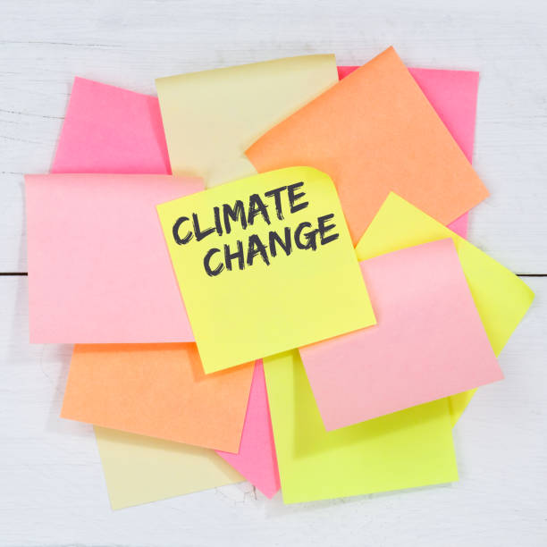 istock Climate change CO2 clean air protection environment nature desk note paper 1378742713
