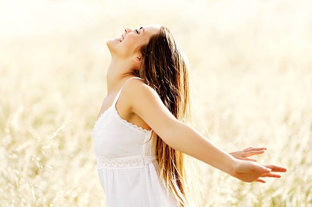 istock joyful carefree woman 137876360