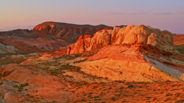 AERIAL Beautiful colourful landscape of the Valley of Fire in Nevada at sunrise