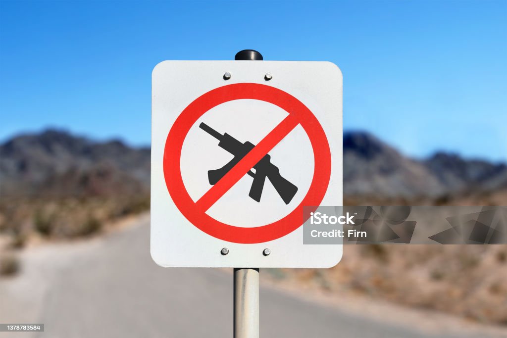 No weapons sign No weapons sign with machine gun crossed out in red Weapon Stock Photo