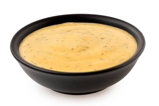 istock Honey and mustard sauce with dill in a black ceramic bowl. 1378804896