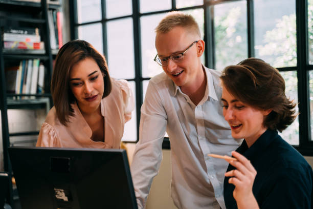 istock Group of business people working together in office 1378822236