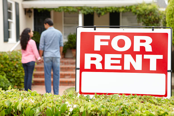 istock Hispanic couple outside home for rent 137882474