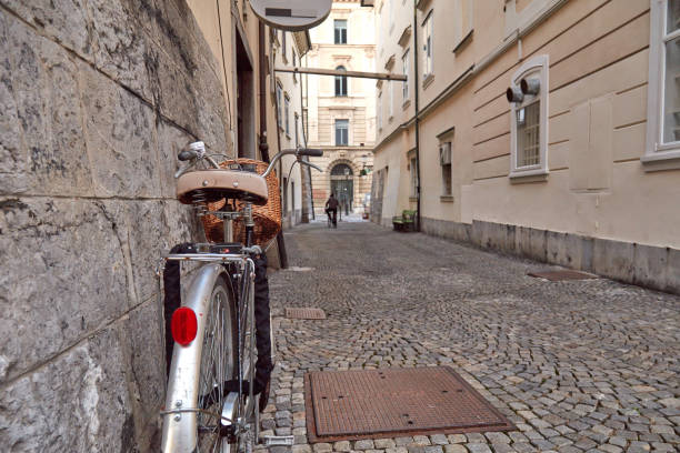 istock Retro bicycle in empty street - alley. 1378845327
