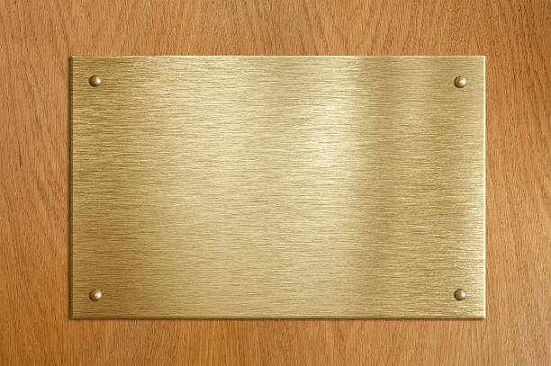 istock Wooden plaque with gold or brass plate 137884793