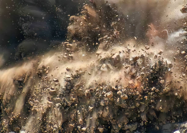 Extreme close up of a blast Broken rock during detonator blast on the mining site explosive photos stock pictures, royalty-free photos & images