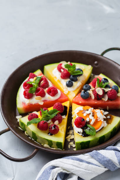 istock Watermelon pizza with berries, fruit, yogurt, feta cheese 1378852989