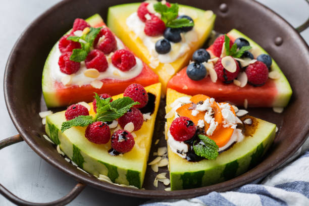 istock Watermelon pizza with berries, fruit, yogurt, feta cheese 1378857430